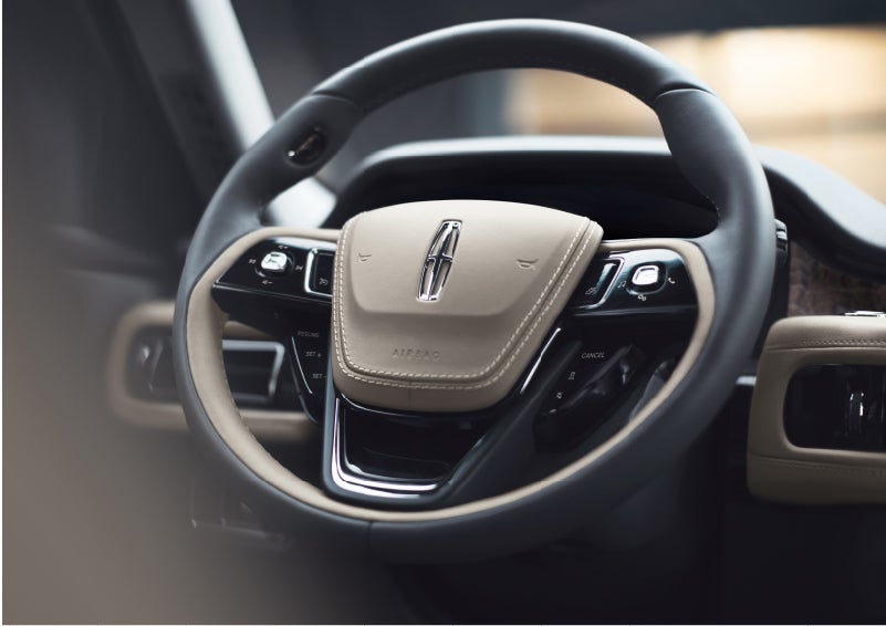 The intuitively placed controls of the steering wheel on a 2023 Lincoln Aviator® SUV | Lincoln of Coconut Creek in Coconut Creek FL