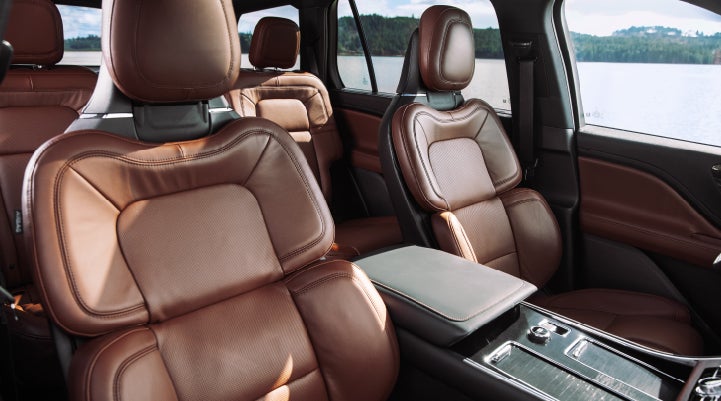 The front row's Perfect Position Seats in a 2024 Lincoln Aviator® Reserve model with Ebony Roast interior | Lincoln of Coconut Creek in Coconut Creek FL