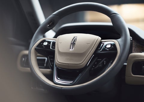 The intuitively placed controls of the steering wheel on a 2024 Lincoln Aviator® SUV | Lincoln of Coconut Creek in Coconut Creek FL