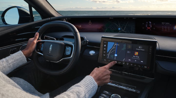 The driver of a 2024 Lincoln Nautilus® SUV interacts with the new Lincoln Digital Experience. | Lincoln of Coconut Creek in Coconut Creek FL