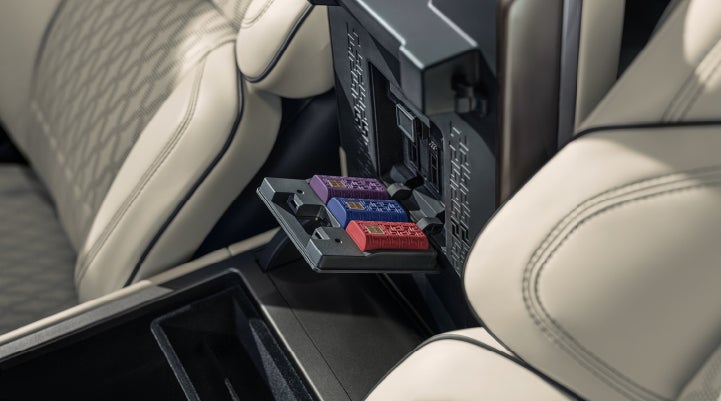 Digital Scent cartridges are shown in the diffuser located in the center arm rest. | Lincoln of Coconut Creek in Coconut Creek FL